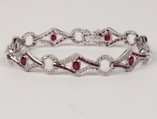 Appraisal: K WHITE GOLD RUBY AND DIAMOND BRACELET HAVING CTW RUBIES