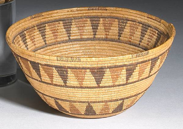 Appraisal: A Panamint polychrome basket Very finely woven with mirror-image bands