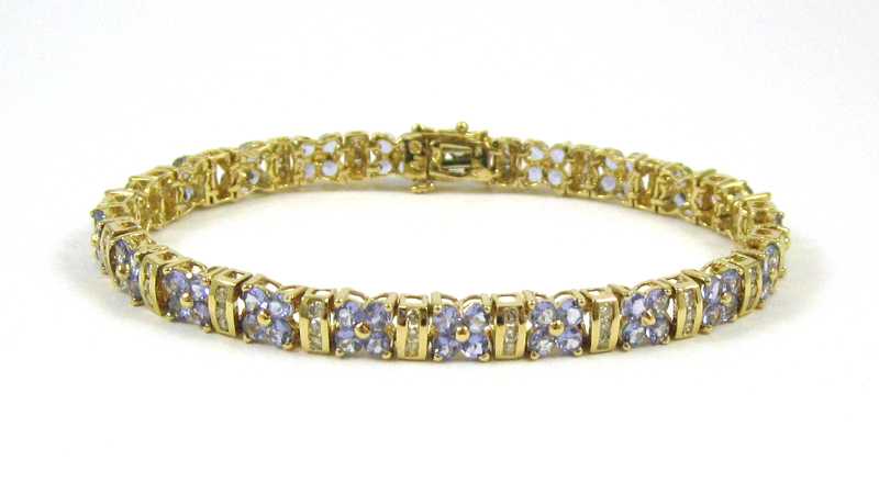 Appraisal: TANZANITE AND FOURTEEN KARAT GOLD BRACELET measuring inches in length