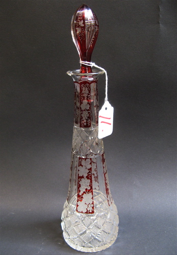 Appraisal: RUBY-RED CLEAR GLASS DECANTER cut and engraved decoration vintage grape