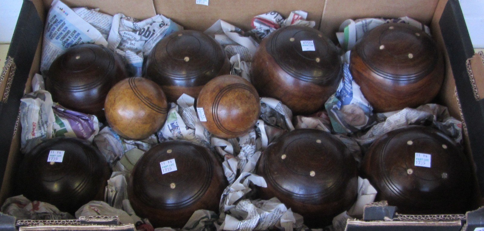 Appraisal: A set of eight Victorian Lignum Vitae bowls with ivory