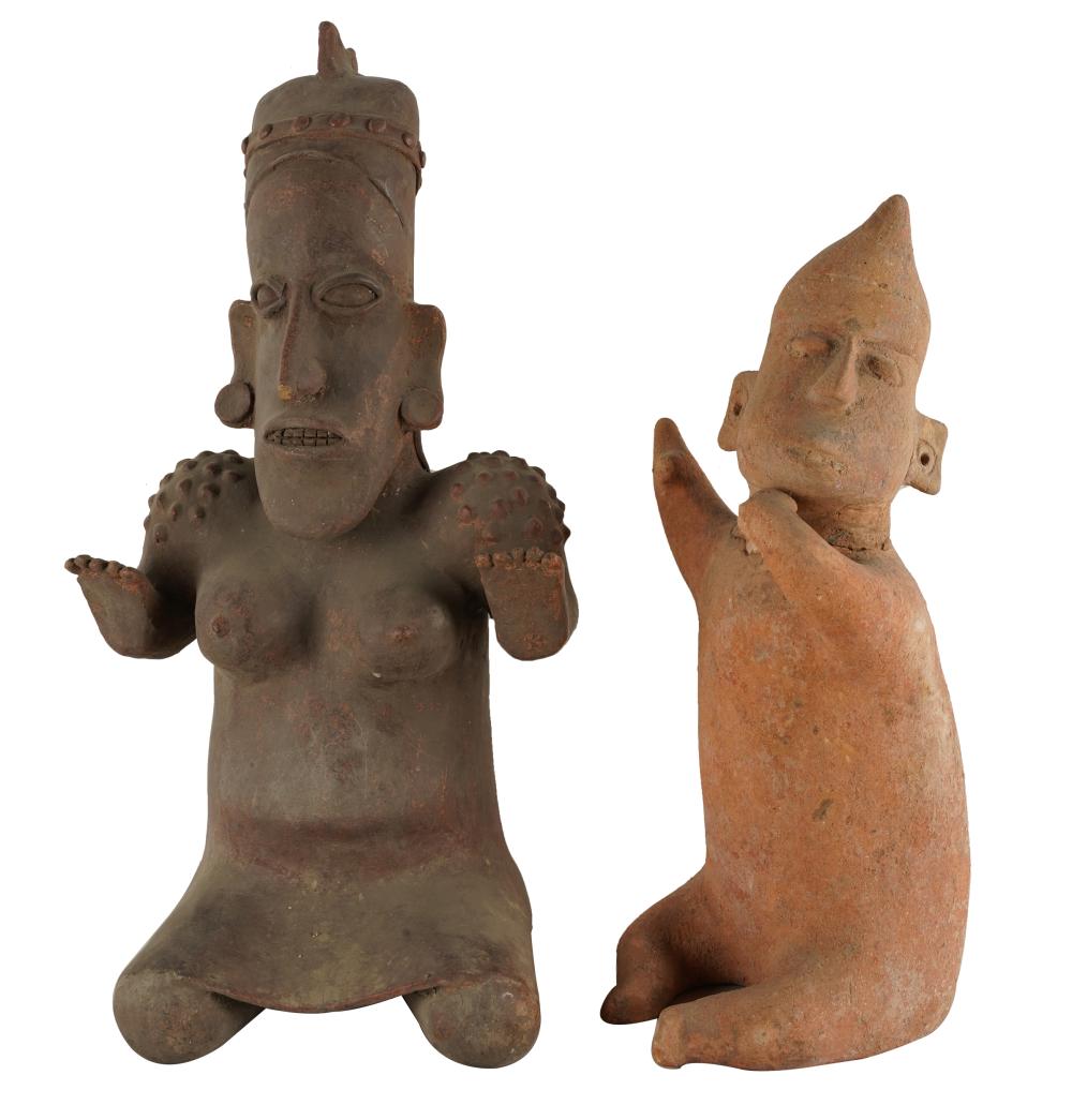 Appraisal: TWO PRIMITIVE EARTHENWARE FIGURESCondition each with break and repair to