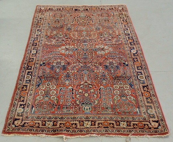 Appraisal: - Sarouk oriental center hall carpet with red field and