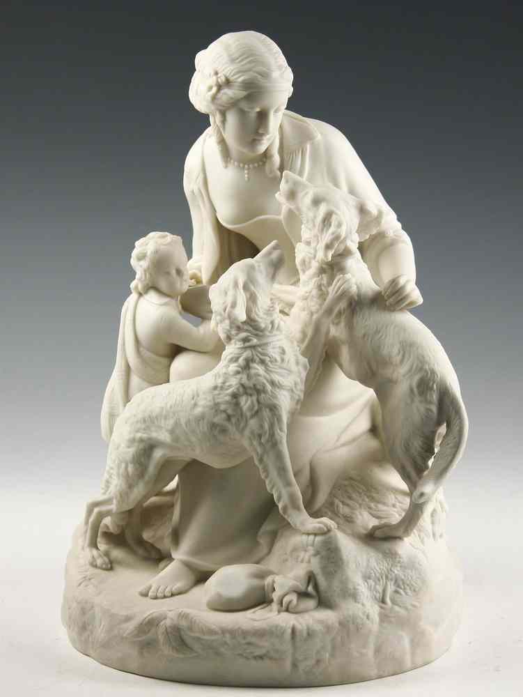 Appraisal: PARIANWARE FIGURAL GROUP - Seated Woman with Child and two