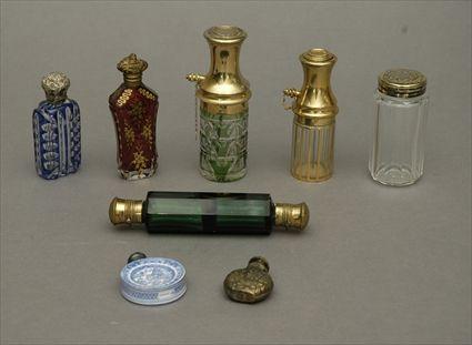 Appraisal: Eight Assorted Glass Brass and Pottery Scent Bottles to in