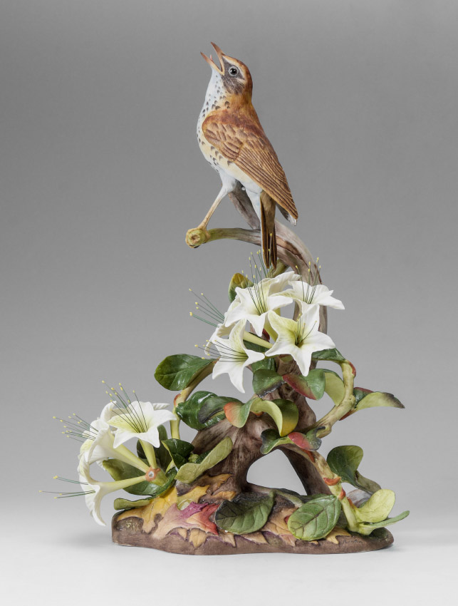 Appraisal: BOEHM PORCELAIN WOOD THRUSH BIRD SCULPTURE The male he measures