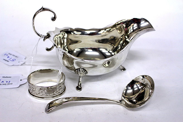 Appraisal: AN EARLY TH CENTURY BIRMINGHAM SILVER SAUCE BOAT cm in