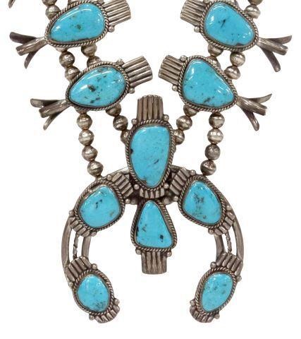 Appraisal: Large Native American silver content unknown and turquoise squash blossom