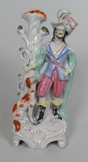 Appraisal: Staffordshire Figural Spill Vase of Male with Dog Staffordshire Figural