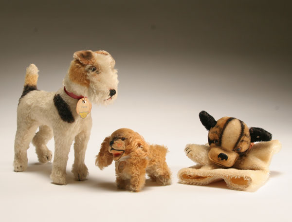 Appraisal: Steiff terrier spaniel and bulldog puppet Foxy Cockie and hand