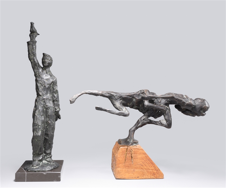 Appraisal: Two decorative bronzes including a pair of football or rugby