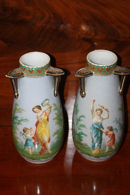 Appraisal: A PAIR OF AUSTRIAN PALE BLUE GROUND PORCELAIN VASES each