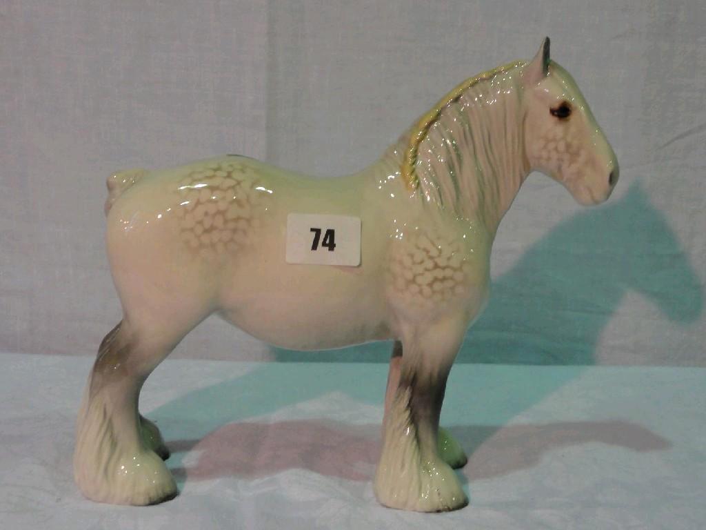 Appraisal: A Beswick model of a standing Shire Horse with dappled