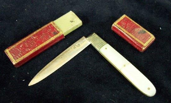 Appraisal: A late Georgian fruit knife with silver blade and mother-of-pearl