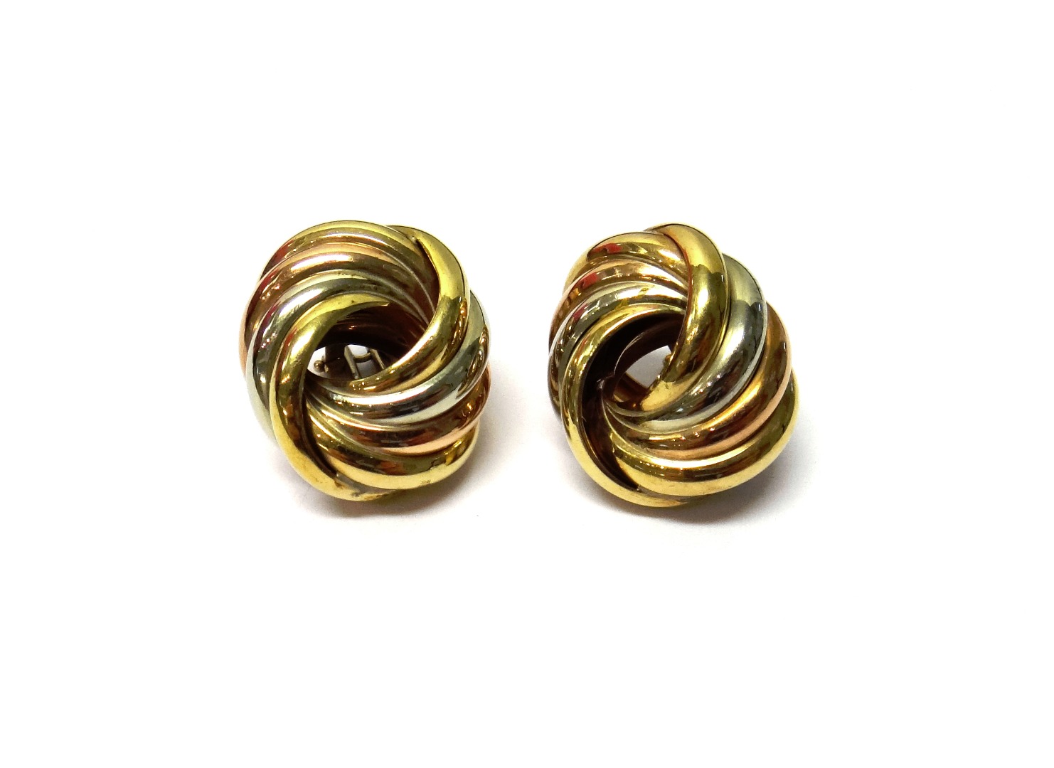 Appraisal: A pair of ct three colour gold earclips each in