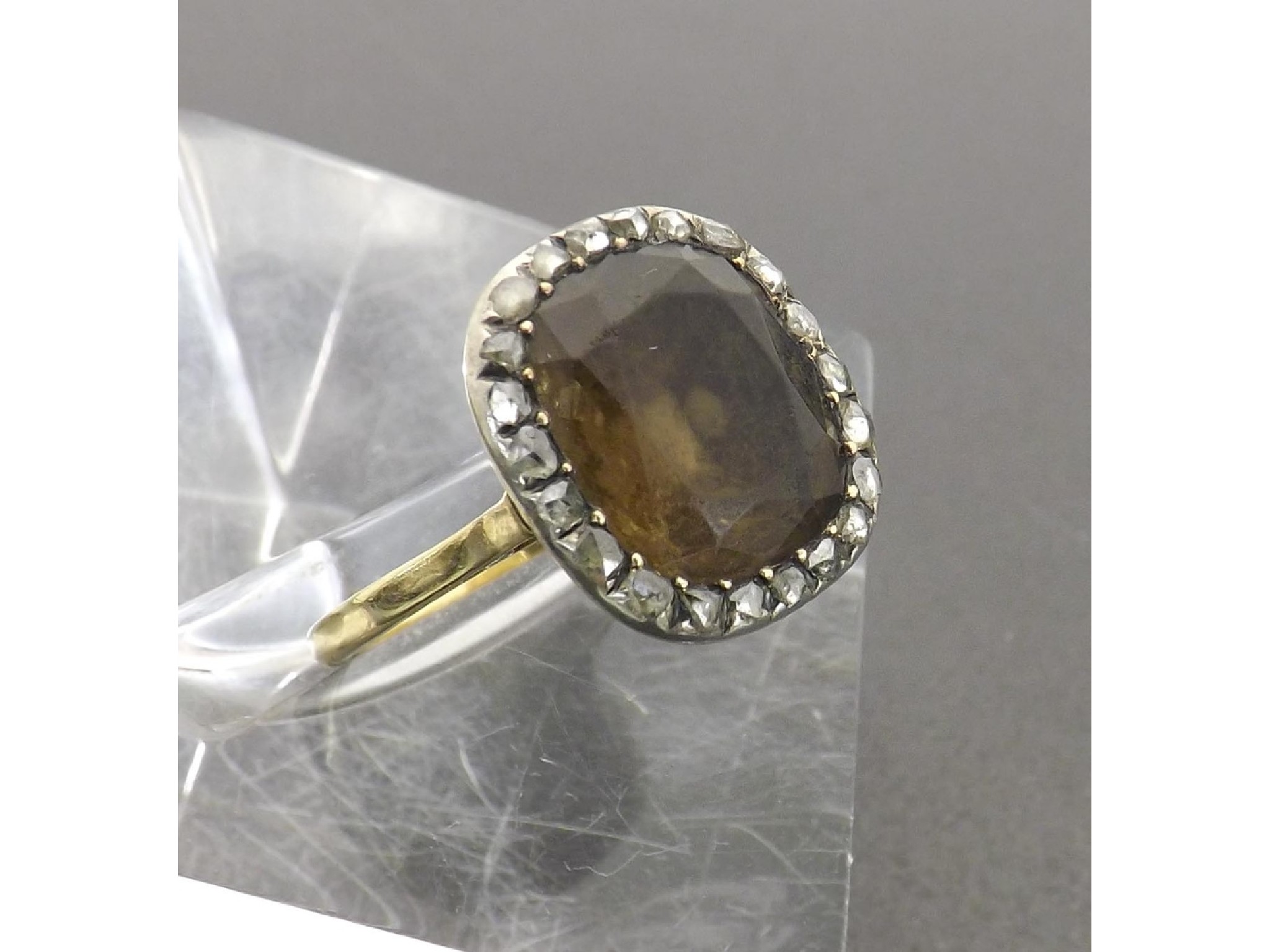 Appraisal: Antique gold backed quartz and diamond oval cluster ring the