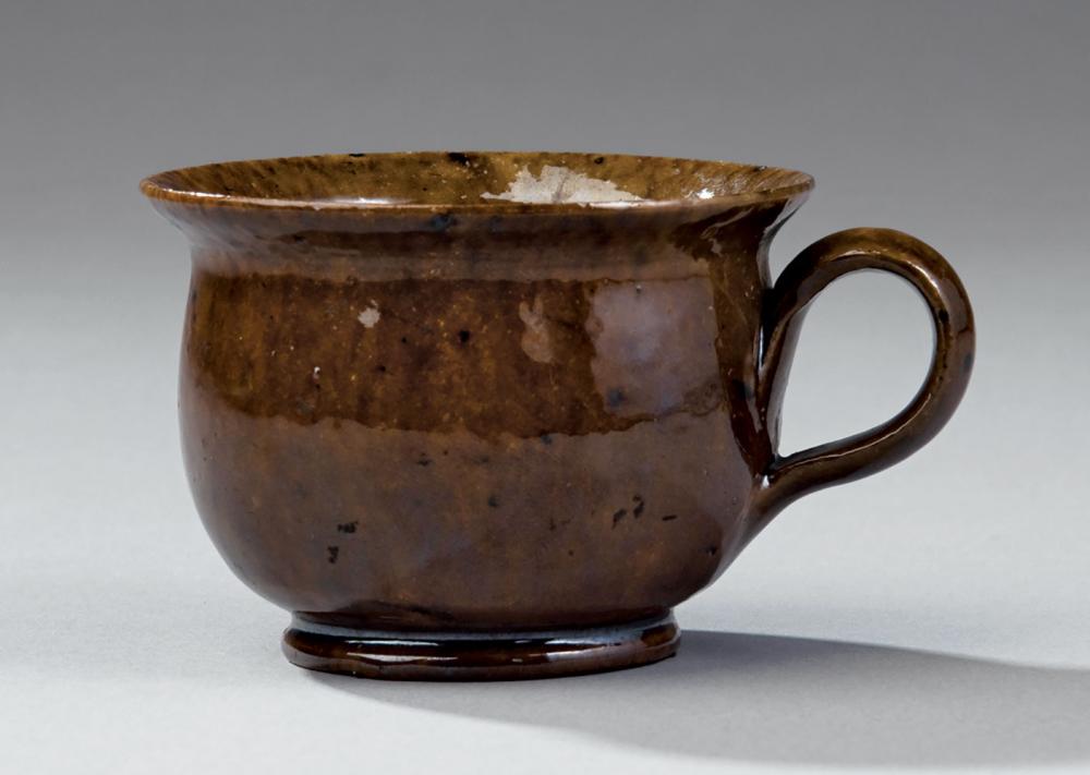 Appraisal: George Ohr Humorous Teacup in the Form of a Chamber