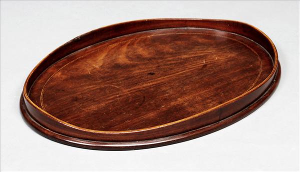 Appraisal: A George III mahogany oval tray circa the gallery with