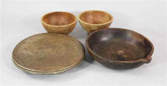 Appraisal: Three wooden dairy bowls one with handle and pouring lip