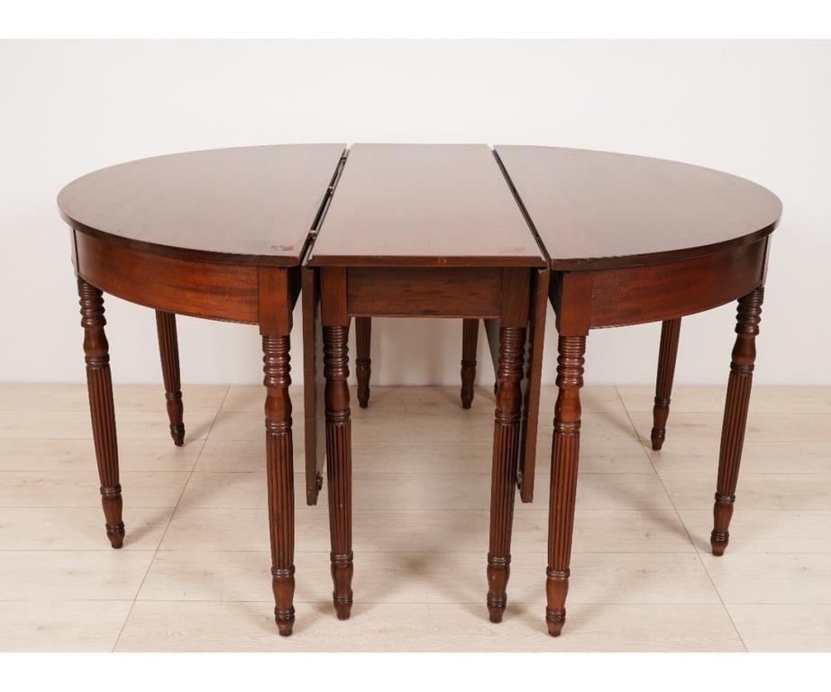 Appraisal: Sheraton mahogany three-part banquet table circa with round reeded legs