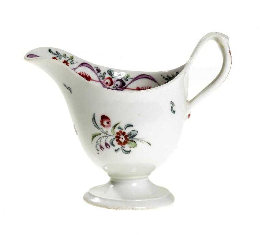 Appraisal: A NEW HALL CREAM JUG pattern of helmet shape with