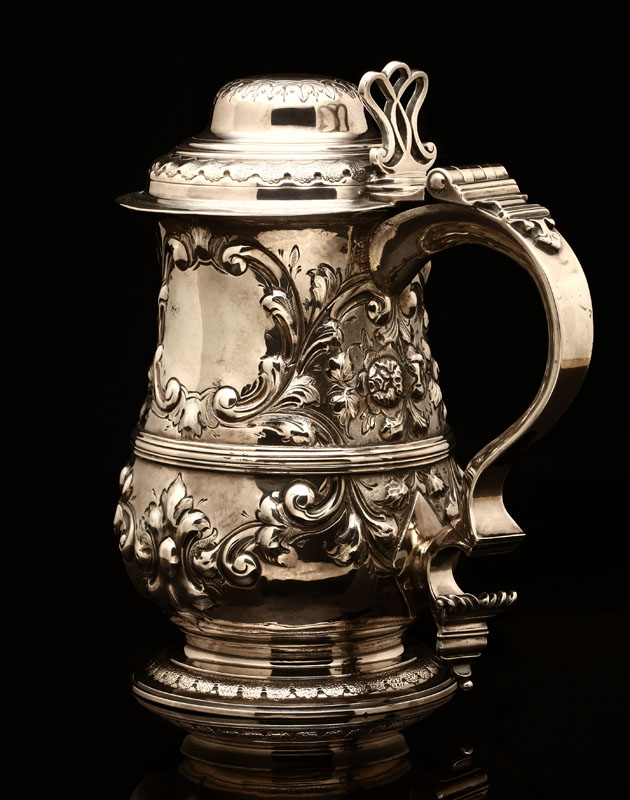 Appraisal: A George III sterling silver foliate-decorated tankard London with maker's