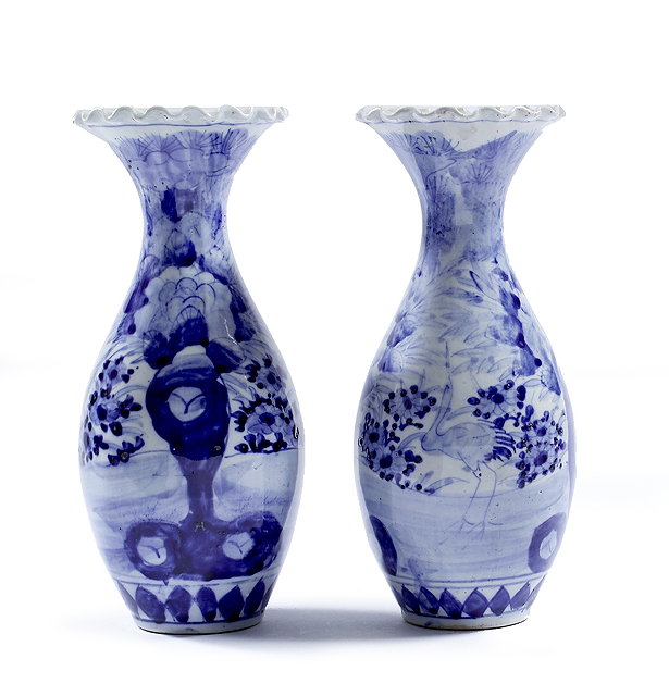 Appraisal: A pair of Japanese blue Imari vaseslate th Centuryeach with