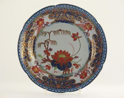 Appraisal: A Turner's stone china plate painted with pine and flowers