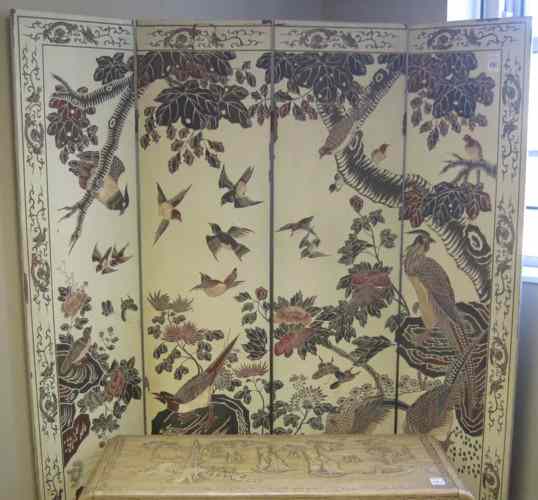 Appraisal: CHINESE COROMANDEL FLOOR SCREEN featuring incise-carved pictorial across four ivory