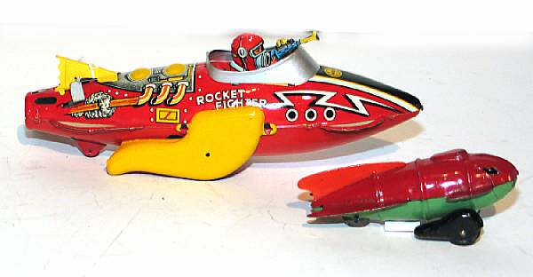 Appraisal: Space Vehicles Lot features a brightly lithographed Marx Rocket Fighter