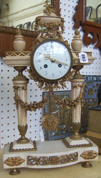 Appraisal: A French white marble portico clock th century with urn