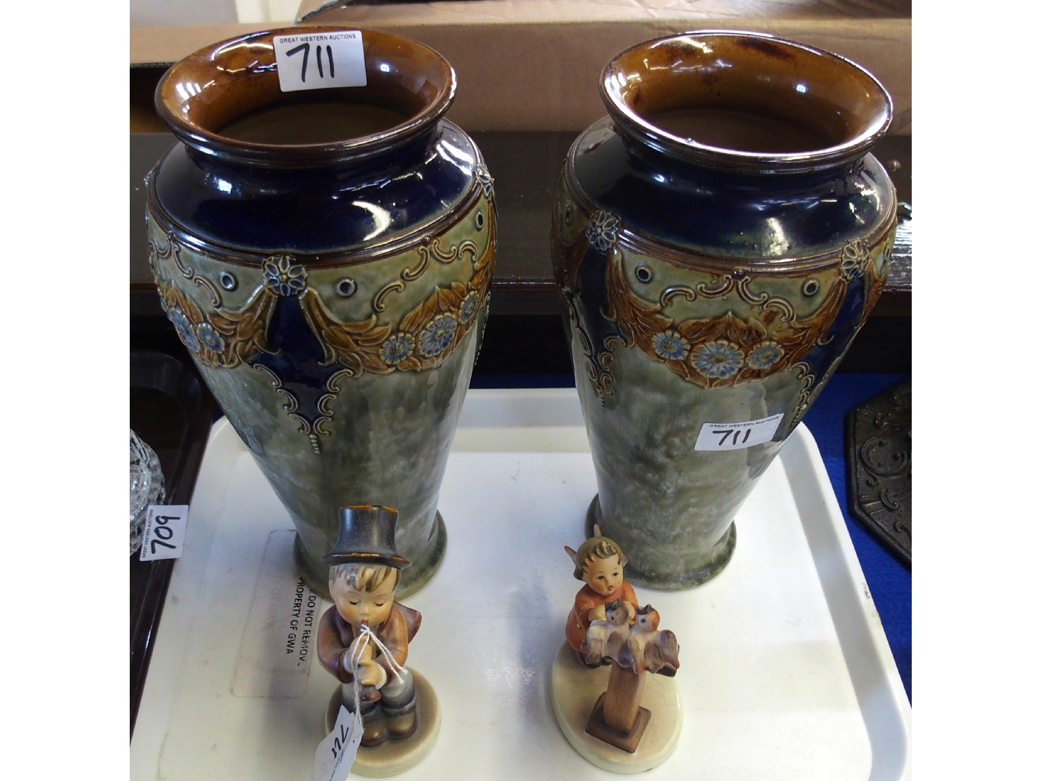 Appraisal: Pair of Doulton stoneware vases and two Hummel figures