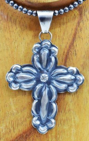 Appraisal: Native American sterling silver cross pendant T Yazzie on an