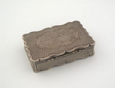 Appraisal: A Victorian snuff box with serpentine edge engine turning and