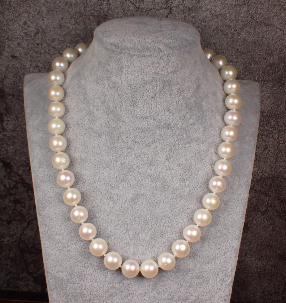 Appraisal: PRINCESS LENGTH PEARL AND FOURTEEN KARAT GOLD NECKLACE The -