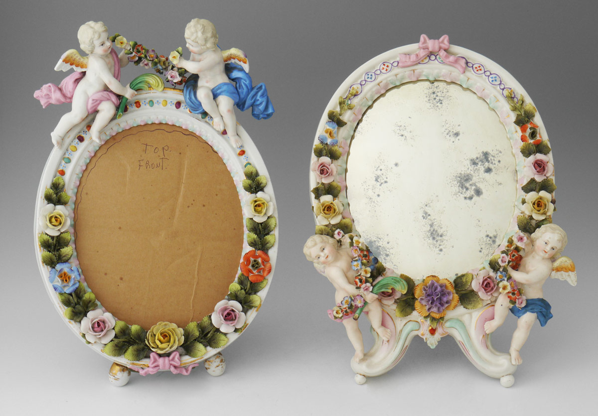 Appraisal: PAIR OF SITZENDORF FIGURAL PORCELAIN FRAMES To include Pink bow