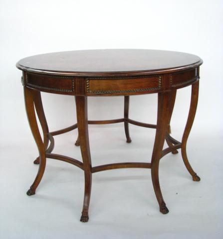 Appraisal: A Period Style with banded top and sunburst veneer top