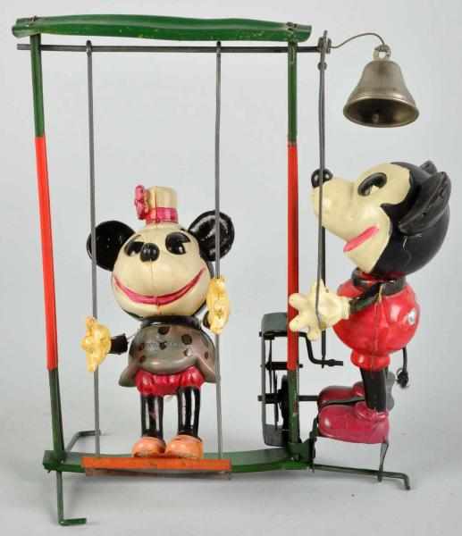 Appraisal: Celluloid Walt Disney Mickey Minnie Swing Toy Description Japanese Pre-war