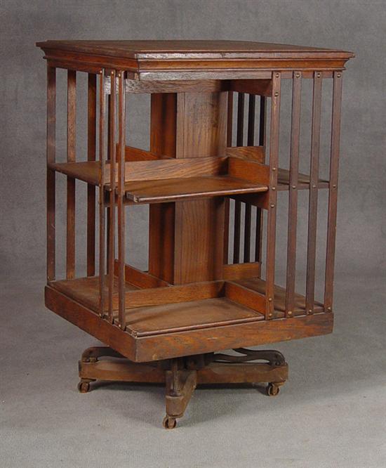 Appraisal: Oak Revolving Bookcase Early th Century Brass Arts Crafts style