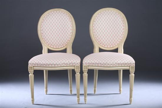 Appraisal: PAIR LOUIS XVI STYLE PAINTED MEDALLION-BACK SIDECHAIRS th century with