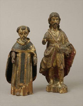 Appraisal: Two Polychrome Carved Wood Santos Figures to in