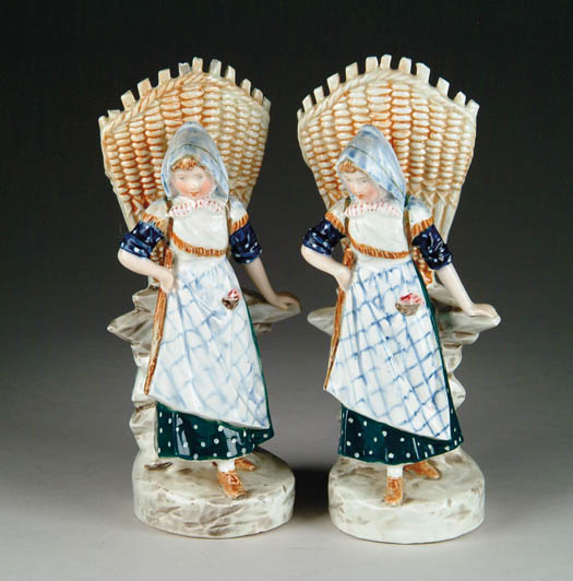 Appraisal: PAIR OF FIGURAL DECORATED VASES Both identical and show young