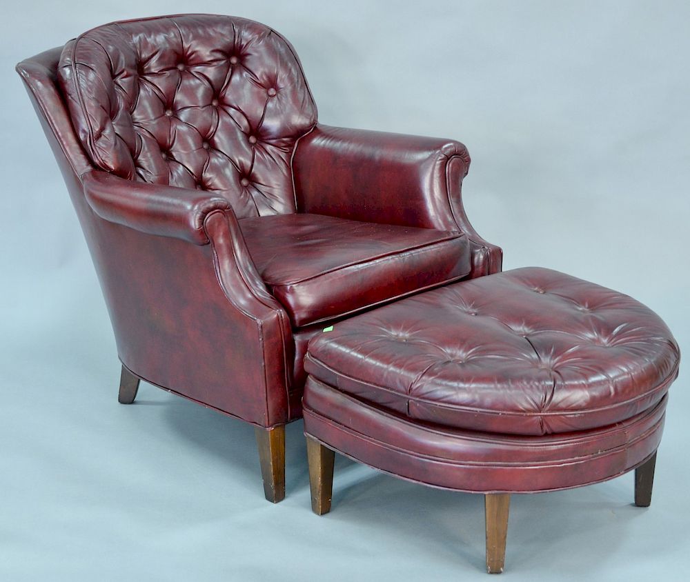 Appraisal: Leather easy chair and ottoman ht in Leather easy chair