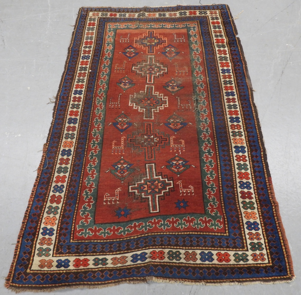 Appraisal: KAZAK PICTORIAL THROW RUG Middle East th CenturyRed blue green