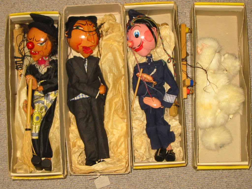 Appraisal: Four Pelham puppets SM Policeman SM Witch both with composition