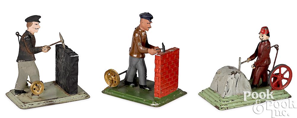 Appraisal: Three workmen steam toy accessories Three painted tin workmen steam