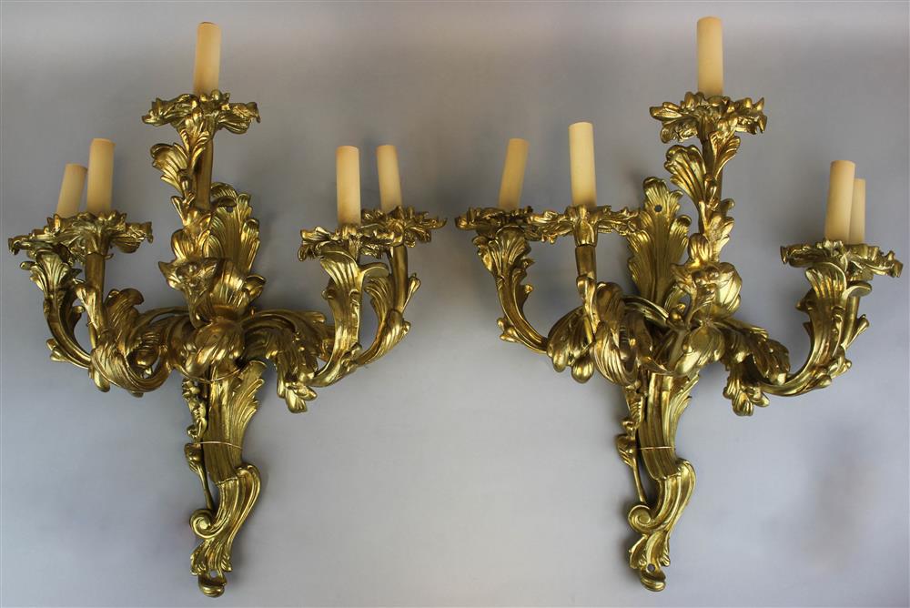 Appraisal: PAIR OF LOUIS XV STYLE BRONZE FIVE LIGHT SCONCES each