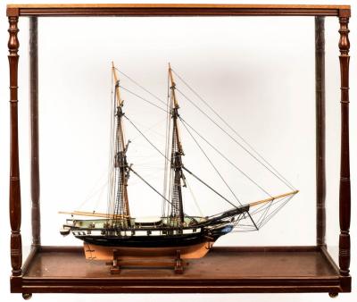 Appraisal: A model of a fully rigged two-masted gun boat in