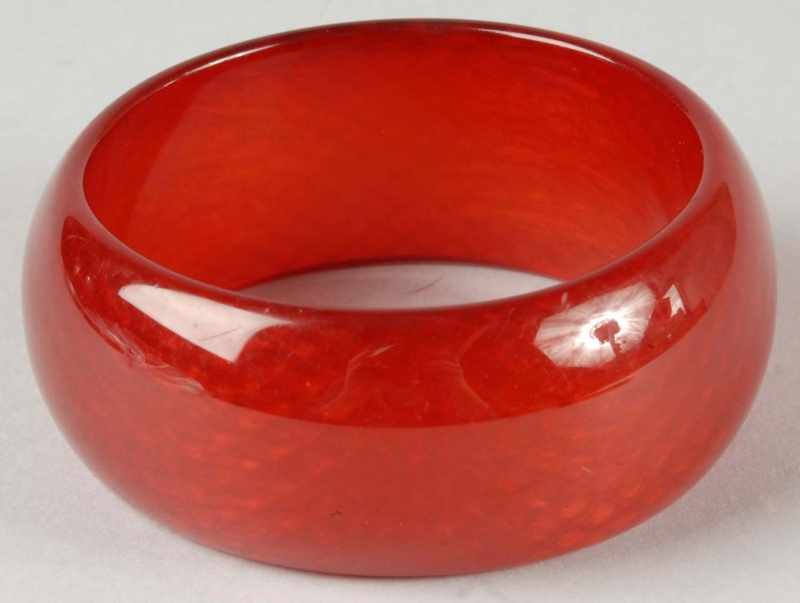 Appraisal: Bakelite Cherry Amber Bracelet Description Unusual inside web pattern Condition