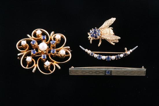 Appraisal: FOUR VINTAGE YELLOW GOLD AND SAPPHIRE PINS Openwork snowflake design